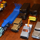 The UPS trucks are 1:55 scale